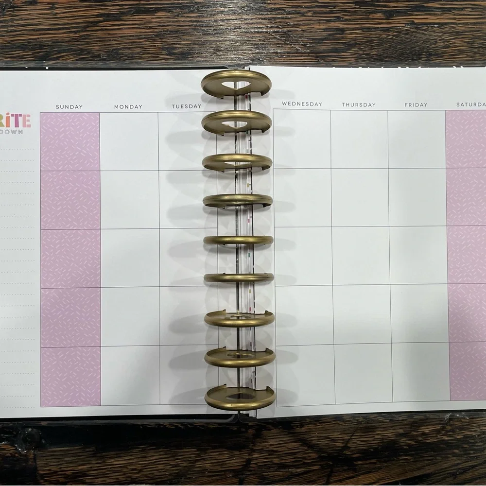 The Happy Planner Colorful Wave Calendar -mix of pages, rings, monthly dividers.